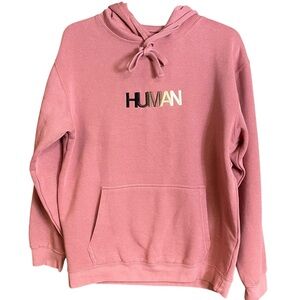 Wear the Peace pink hoodie with HUMAN embroidered on front, size medium